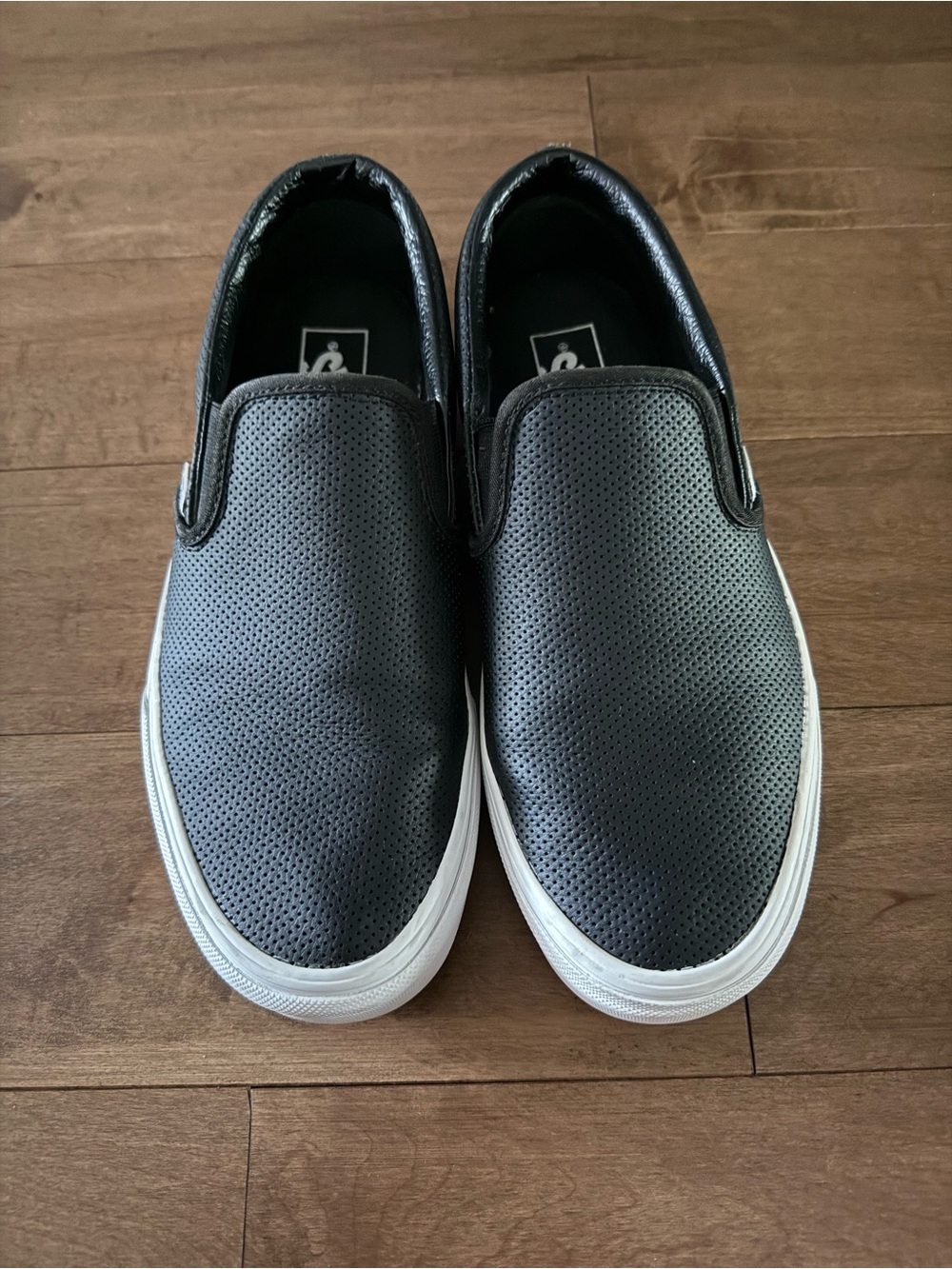 Vans Black Slip-On Perforated Leather Sneakers with White Sole